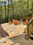 Heading out to the stone patio and fire pit from lower level